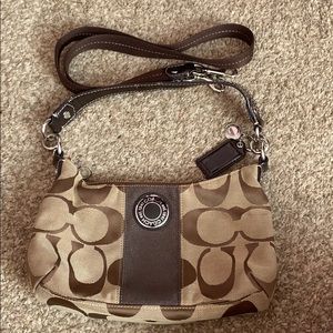 Brown shoulder/crossbody Coach purse